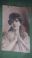 1907. Antique photo postcard with a portrait of a beautiful lady according to the pictures