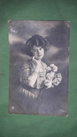 1912. Antique postcard very pretty lady with flowers according to the pictures
