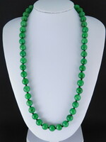14 K gold jade necklace with 8.5 mm stones
