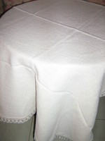Beautiful elegant woven tablecloth with lacy edges