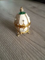 Faberge-style egg gold-plated jewelry holder studded with stones