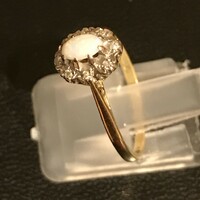 18-carat gold ring with real opal and tiny diamonds