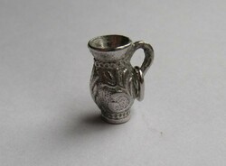 Folk potter's mug, jug, silver pendant