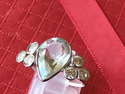 White gold ring with aquamarine and six large moissanite diamonds