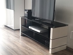 TV stand with white high-gloss black glass shelves