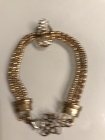 Gold-plated bracelet on a three-row chain with a pendant encrusted with crystals