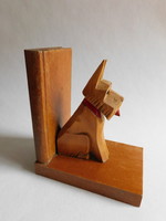 Carved dog bookend