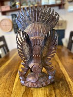Carved garuda statue from Indonesia, in Hidu mythology the representative of strength, strength and positive energies