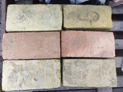 6 bricks with antique years
