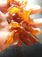Natural, unpolished amber necklace with large eyes