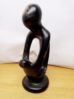 Modern black granite statue: a mother nursing her child, a unique sculptural artefact