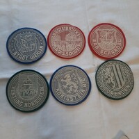 6 pieces of retro coasters with plastic patterns on felt bottoms with coats of arms of German towns