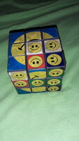 Retro interesting smiley magic cube, rubick-like game cube according to the pictures