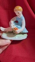 Porcelain figurine of a girl in a blue dress from Bodrogkeresztúr