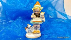 Porcelain little girl with dogs and cats