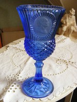 Blue glass vase, candle holder