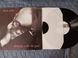 Elton John  "sleeping with the past"