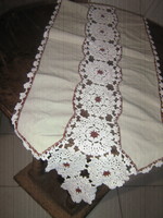 Beautiful hand-crocheted boat-shaped tablecloth runner