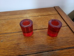 2 red glass candle holders