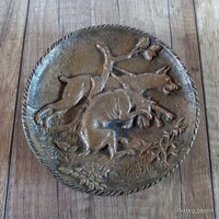 Old bronze bowl with hunting dogs