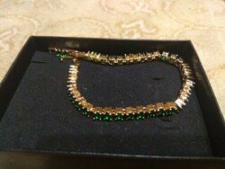 Silver, gold-plated bracelet with green jewels