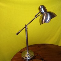 Chrome, tiltable, table or workshop lamp. It works.
