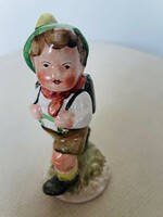 Porcelain figurine: school boy