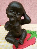 A modern sculptural work of art. Bronze coated ceramic sculpture. Infant