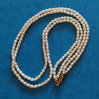 Beautiful two-row genuine cultured pearl necklace with gold-plated silver fittings