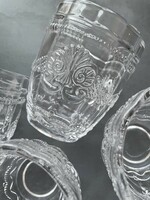 Vintage beautiful transparent patterned water glass with lily pattern, made of thick glass