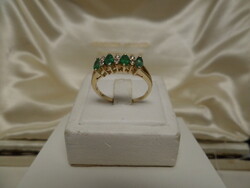 Gold ring with emeralds and brilliants