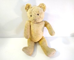 Teddy bear with a wooden base stuffed with old shavings, from around the 1960s