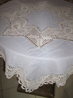 Beautiful blue tablecloth with crocheted edges and inlays