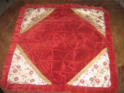 Velvet cushion cover with bright floral decoration in beautiful burgundy corners