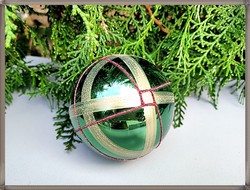 Unique painted and appliqué stripe decoration old green glass sphere ornament.