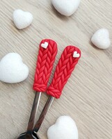 Knitted spoons with little hearts