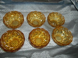 6 amber or honey-colored glass bowls with bays