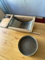 Antique wooden sieve and tomato strainer