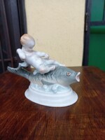 Herend porcelain fish riding boy