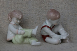 Dressing up children's porcelain figurines