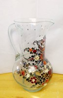 Antique glasswork artefact. A broken wine jug with richly painted bubble inclusions