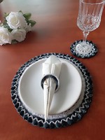 Crocheted plate and coaster with napkin ring, even for special occasions.
