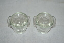 2 small storage and serving bottles