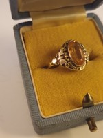 14K old gold ring with a yellow polished sapphire stone