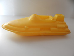 Old plastic speedboat