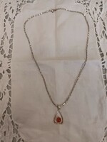 For sale, a lovely old handmade silver chain with a silver carnelian stone pendant!