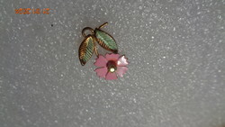 Pendant with a beautiful rose-colored flower