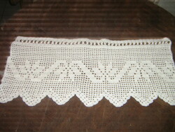 Beautiful hand-crocheted antique stained glass curtain with leaves