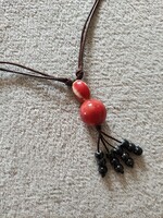 Necklace made of large spherical ceramic beads