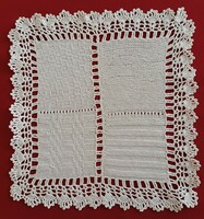 Knitted placemat with 4 different patterns, crochet border
